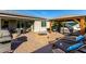 Spacious backyard with hot tub and seating area at 18865 W Mescal St, Surprise, AZ 85388