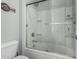 Simple bathroom with a shower/tub combo and neutral decor at 18865 W Mescal St, Surprise, AZ 85388