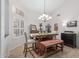 Charming dining area with a wooden table and bench seating at 19822 N Zion Dr, Sun City West, AZ 85375