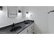 Bathroom with double vanity and updated fixtures at 201 S Greenfield Rd # 205, Mesa, AZ 85206