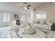 Light and airy living room featuring comfortable seating and a stylish coffee table at 20449 N 105Th Ave, Peoria, AZ 85382