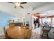 Dining area with a wooden table, adjacent to the kitchen at 24444 N 40Th Ln, Glendale, AZ 85310