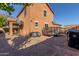 Backyard view with basketball hoop and storage at 314 N 79Th Pl, Mesa, AZ 85207