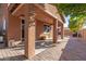 Backyard patio with brick pavers and covered area at 314 N 79Th Pl, Mesa, AZ 85207