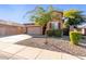 House exterior, two-car garage, and landscaping at 314 N 79Th Pl, Mesa, AZ 85207