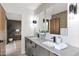 Double vanity bathroom with modern fixtures and finishes at 4216 N 38Th St # C, Phoenix, AZ 85018