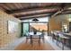 Dining area with wood table and chairs, looking towards kitchen and backyard at 4216 N 38Th St # C, Phoenix, AZ 85018