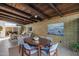 Mid-century modern dining room with wood table and chairs at 4216 N 38Th St # C, Phoenix, AZ 85018