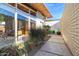 Courtyard entry with walkway, landscaping, and view into the home at 4216 N 38Th St # C, Phoenix, AZ 85018