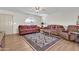 Living room with wood floors, and southwestern decor at 7960 E Madero Ave, Mesa, AZ 85209