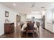 Open dining area with a table and view of the bright kitchen with an island and stainless appliances at 813 E Glendale Ave, Phoenix, AZ 85020