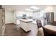 Bright kitchen with skylights, a center island, stainless steel appliances and mosaic backsplash at 813 E Glendale Ave, Phoenix, AZ 85020