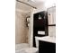 Updated bathroom with shower and cabinet storage at 8213 S 25Th St, Phoenix, AZ 85042