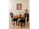 Simple dining area with round wooden table and chairs at 8213 S 25Th St, Phoenix, AZ 85042