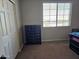 Bedroom with a dresser and closet at 8605 W Carole Ln, Glendale, AZ 85305