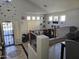 Two-story entryway with a view of the living room and dining area at 8605 W Carole Ln, Glendale, AZ 85305