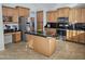 Kitchen with stainless steel appliances and ample cabinet space at 8605 W Carole Ln, Glendale, AZ 85305