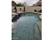 Relaxing pool with water feature and lounge chair, perfect for outdoor enjoyment at 8605 W Carole Ln, Glendale, AZ 85305