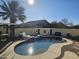 Stunning kidney shaped pool with spa and landscaped backyard at 8605 W Carole Ln, Glendale, AZ 85305