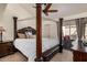 Spacious bedroom with a king-size bed and a ceiling fan at 8849 S 48Th St # 2, Phoenix, AZ 85044