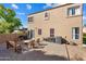 Backyard patio with fire pit and seating area at 9377 E Corrine Dr, Scottsdale, AZ 85260