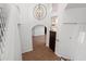 Elegant entryway with high ceilings, hardwood floors, and a stunning chandelier at 9377 E Corrine Dr, Scottsdale, AZ 85260