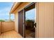 Private balcony with tile flooring and sliding glass door at 9734 N 105Th Dr, Sun City, AZ 85351