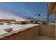 Balcony view of neighborhood with palm trees at 9734 N 105Th Dr, Sun City, AZ 85351