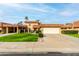 Two-story home with tile roof and grassy front yard at 9734 N 105Th Dr, Sun City, AZ 85351