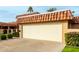 Attached garage with automatic door and extra storage at 9734 N 105Th Dr, Sun City, AZ 85351