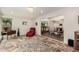 Sunken living room with tiled floors and views to dining area at 9734 N 105Th Dr, Sun City, AZ 85351