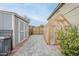 Backyard features a shed, greenhouse, and pavers at 12527 W Sierra Vista Ct, Glendale, AZ 85307