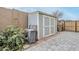 Backyard shed features a utility sink and is located on a paver patio at 12527 W Sierra Vista Ct, Glendale, AZ 85307