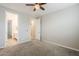 Neutral bedroom featuring carpet, recessed lighting and access to ensuite bathroom and walk in closet at 12527 W Sierra Vista Ct, Glendale, AZ 85307