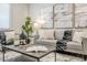 Cozy living room featuring stylish furniture, a modern coffee table, and decorative accents at 12527 W Sierra Vista Ct, Glendale, AZ 85307