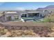 Aerial view of a modern home with a large pool and landscaped backyard at 12808 E Harper Dr, Scottsdale, AZ 85255