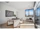 Bright dining area with large window and modern furniture at 12808 E Harper Dr, Scottsdale, AZ 85255