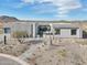 Contemporary home with clean lines and desert landscaping at 12808 E Harper Dr, Scottsdale, AZ 85255