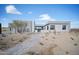 Modern home with stone walkway and desert landscaping at 12808 E Harper Dr, Scottsdale, AZ 85255