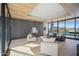 Relaxing living room with wood ceiling, comfortable seating, and pool view at 12808 E Harper Dr, Scottsdale, AZ 85255