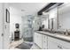 Spa-like bathroom featuring double vanity and a walk-in shower at 144 E Boca Raton Rd, Phoenix, AZ 85022