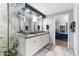 Elegant bathroom with double sinks and a large shower at 144 E Boca Raton Rd, Phoenix, AZ 85022