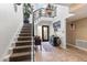 Spacious entryway with a view to the living room and staircase at 144 E Boca Raton Rd, Phoenix, AZ 85022