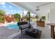 Relaxing patio with pool, seating area, and outdoor bar at 144 E Boca Raton Rd, Phoenix, AZ 85022