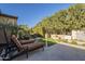 Backyard with lounge chairs and green grass at 1620 E Azafran Trl, Queen Creek, AZ 85140