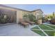 View of the house and patio with lounge chairs at 1620 E Azafran Trl, Queen Creek, AZ 85140