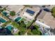 Aerial view of house with pool and solar panels at 2415 W Weatherby Way, Chandler, AZ 85286