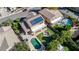 Aerial view of house with solar panels, pool, and spa at 2415 W Weatherby Way, Chandler, AZ 85286