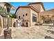 Outdoor kitchen and patio area with built-in grill and heater at 2415 W Weatherby Way, Chandler, AZ 85286