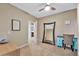 Bedroom with a full-length mirror and desk setup at 2415 W Weatherby Way, Chandler, AZ 85286